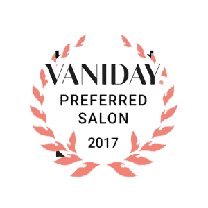 Elegant salon award badge with laurel wreath and VANIDAY Preferred Salon 2017 text.